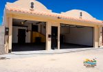 Casa Las Palmas in community Las Palmas San Felipe - front of the house garage doors open